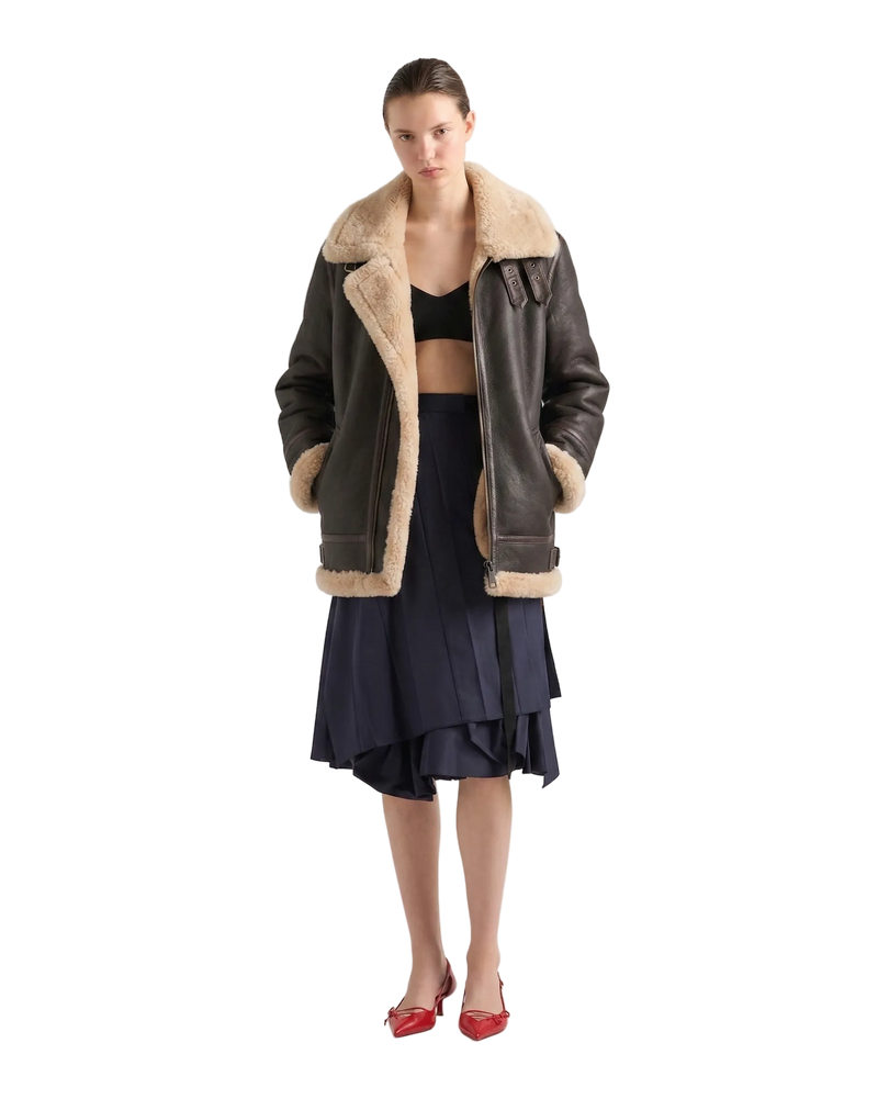 Women's classic brown sheepskin flying jacket with cream woolly fleece lining and bronze zip.