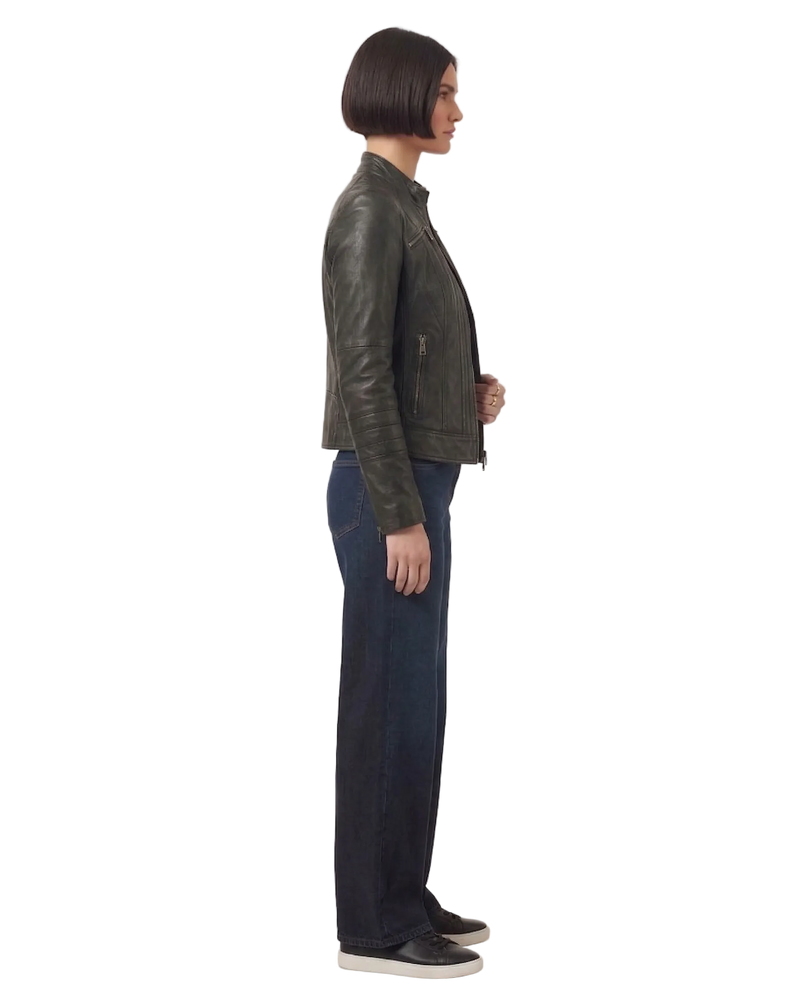 Close-up of top-grade black nappa leather texture and horizontal YKK zip chest pockets